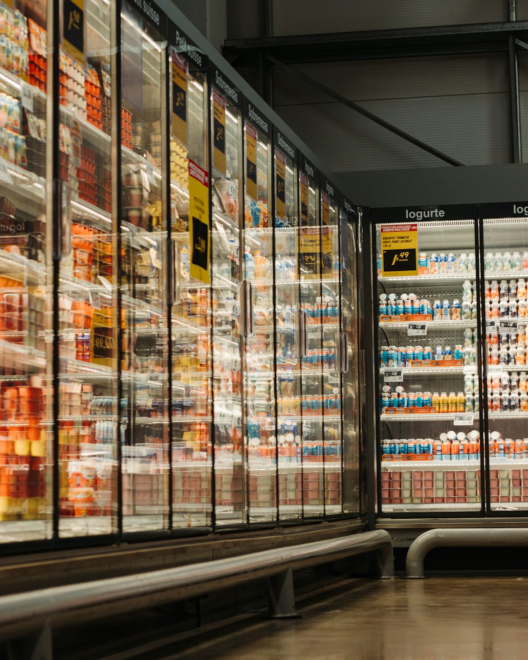 Supermarket refrigerator by Chocolate Brands white and brown labeled boxes