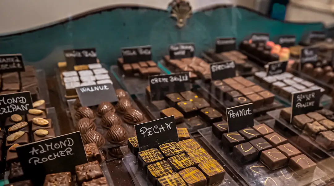 a display case filled with lots of different types of chocolate