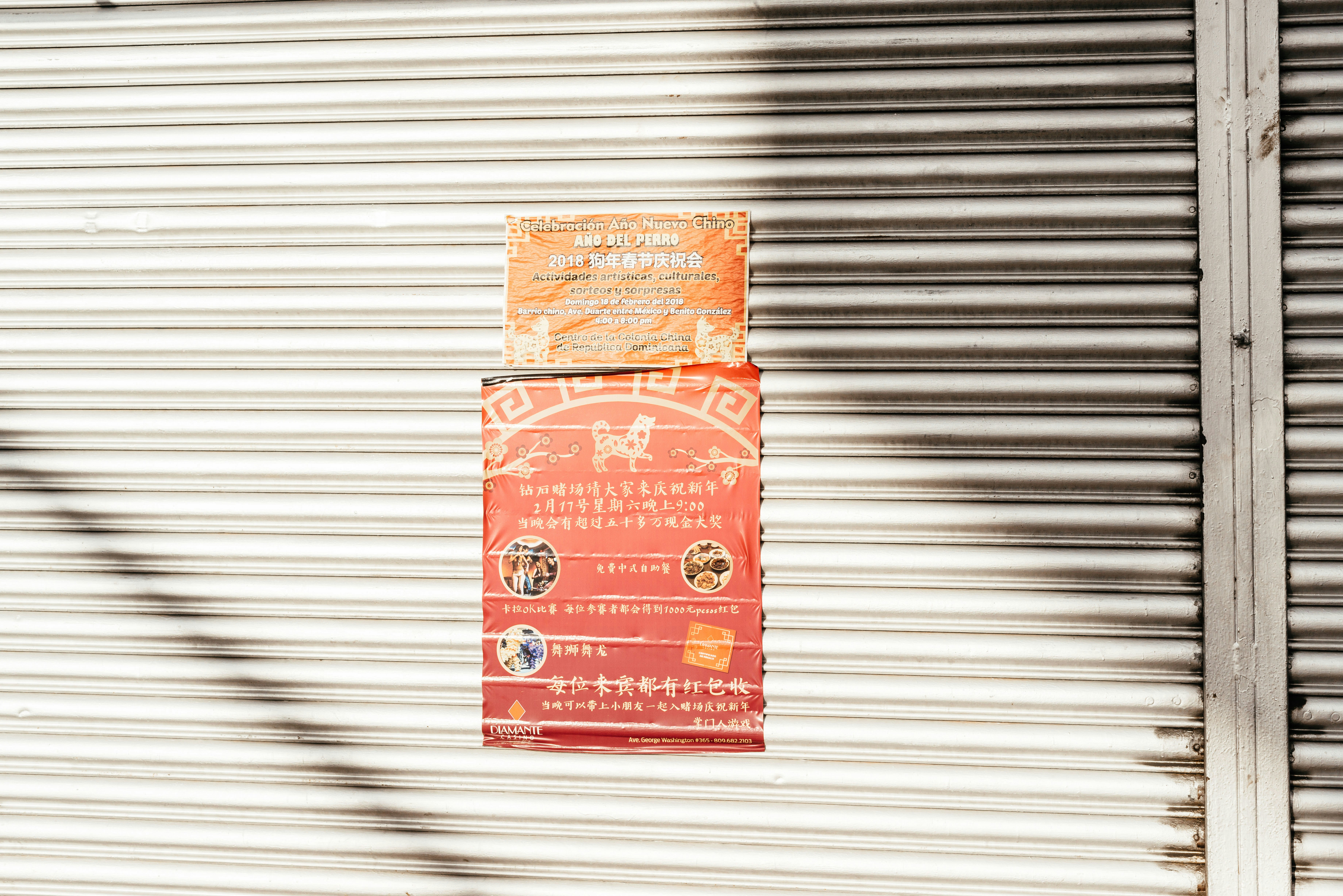 red poster mounted gray shutter roller