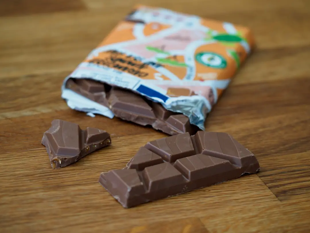 chocolate bars on white and orange plastic pack