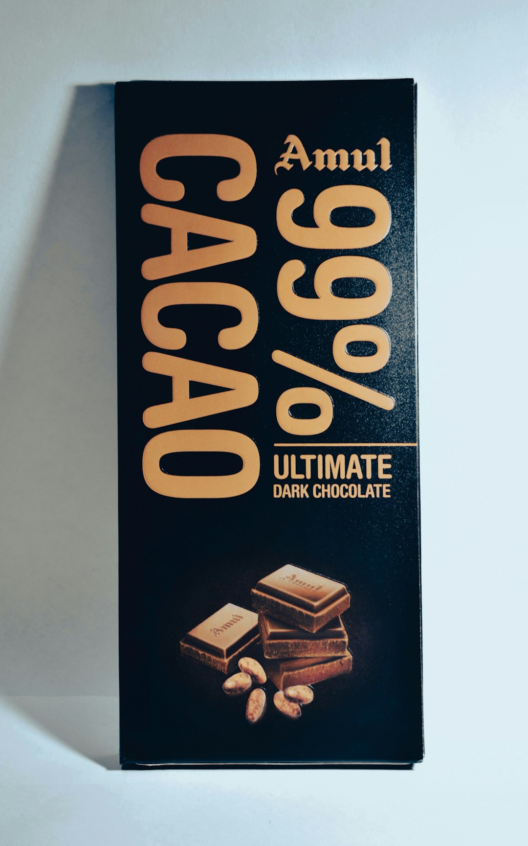 a bar of chocolate with almonds on top of it