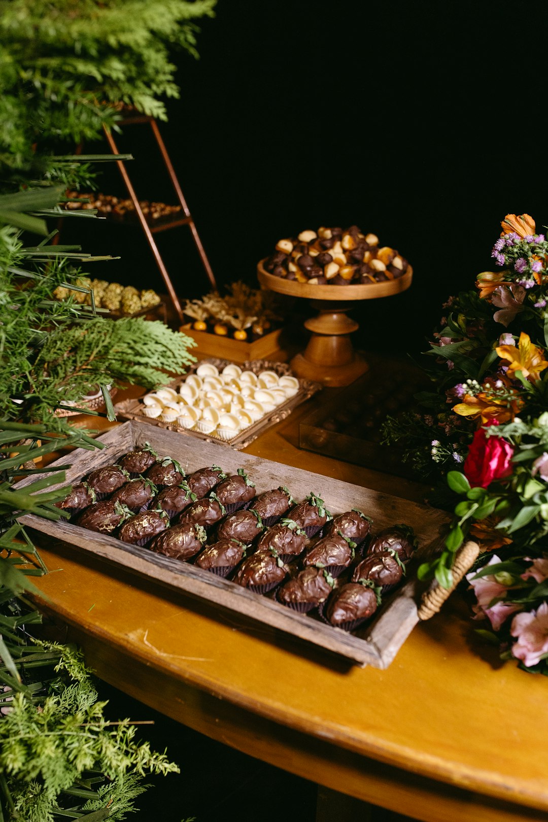 A wooden table topped with lots of food